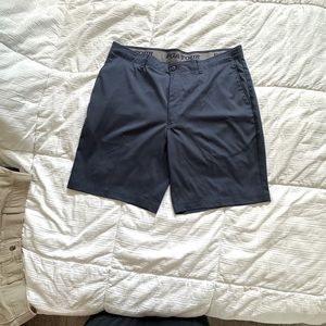 PGA TOUR navy men’s golf shorts.